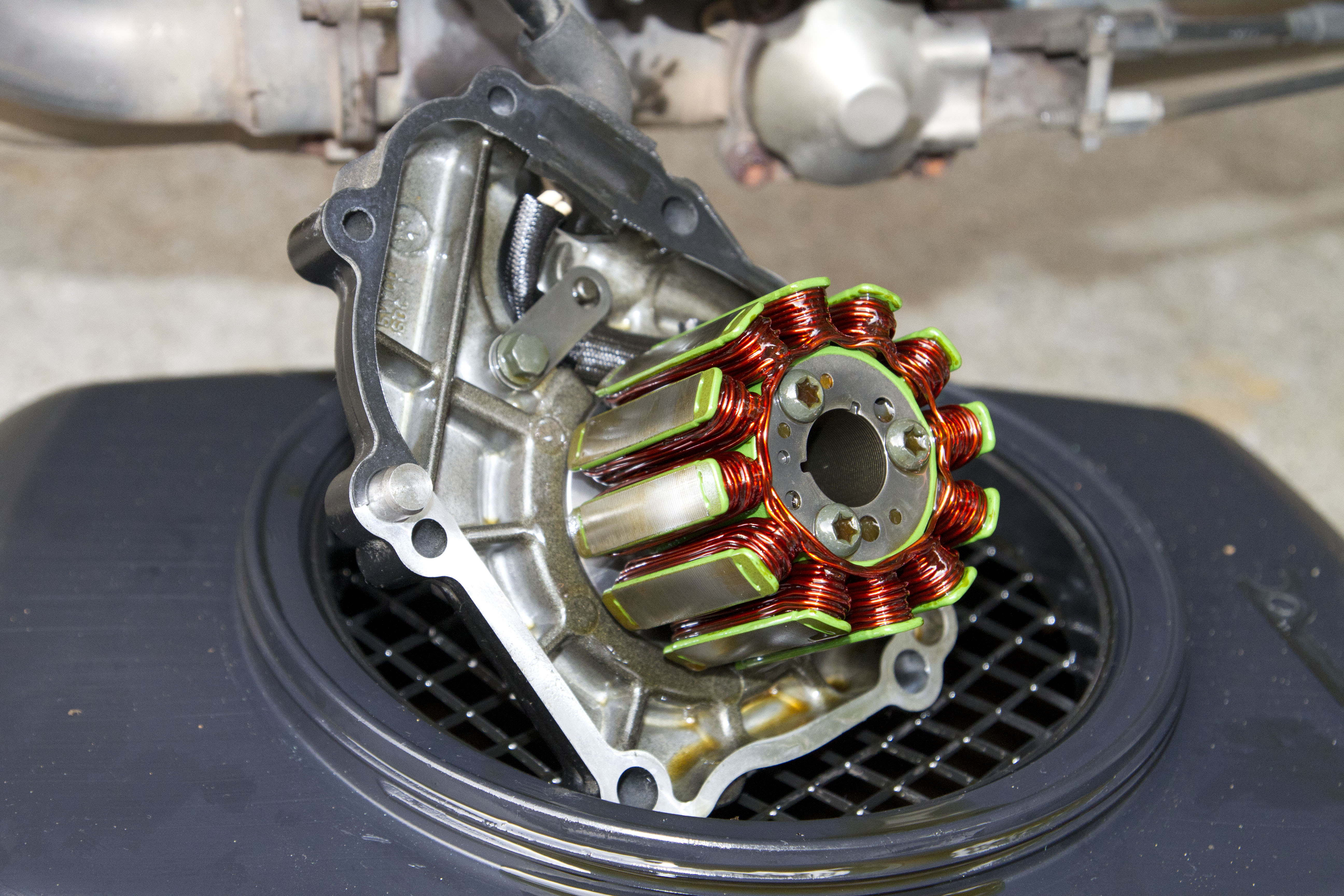 Fixed starter motor problem. Now bike sounds like all cylinders aren't